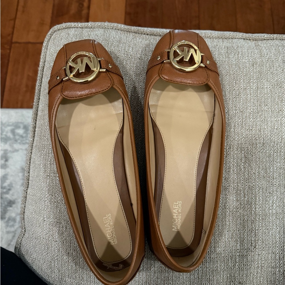 Michael Kors Brown Flats & Loafers with Gold Emblem